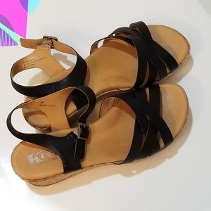 Korks black leather wedges